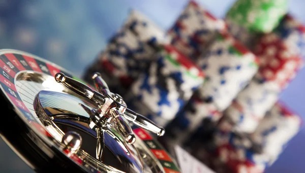 esse live-dealer roulette table streamed on mobile phone with betting interface visible